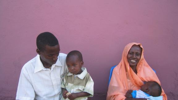 Young couple and clients.